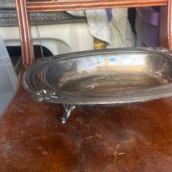 The item in the image is a vintage silver-plated serving dish or tray.
