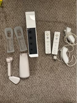 Wii with controllers and games