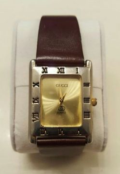Gucci watch.