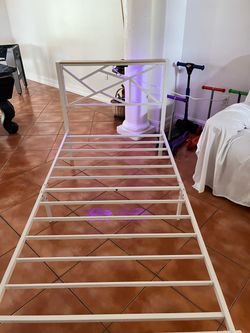 Excellent metal twin bed frame with light and plugs, used less than 3 month sturdy, pick up only 33196