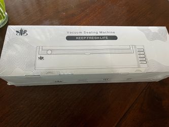 VACUUM SEALING MACHINE
