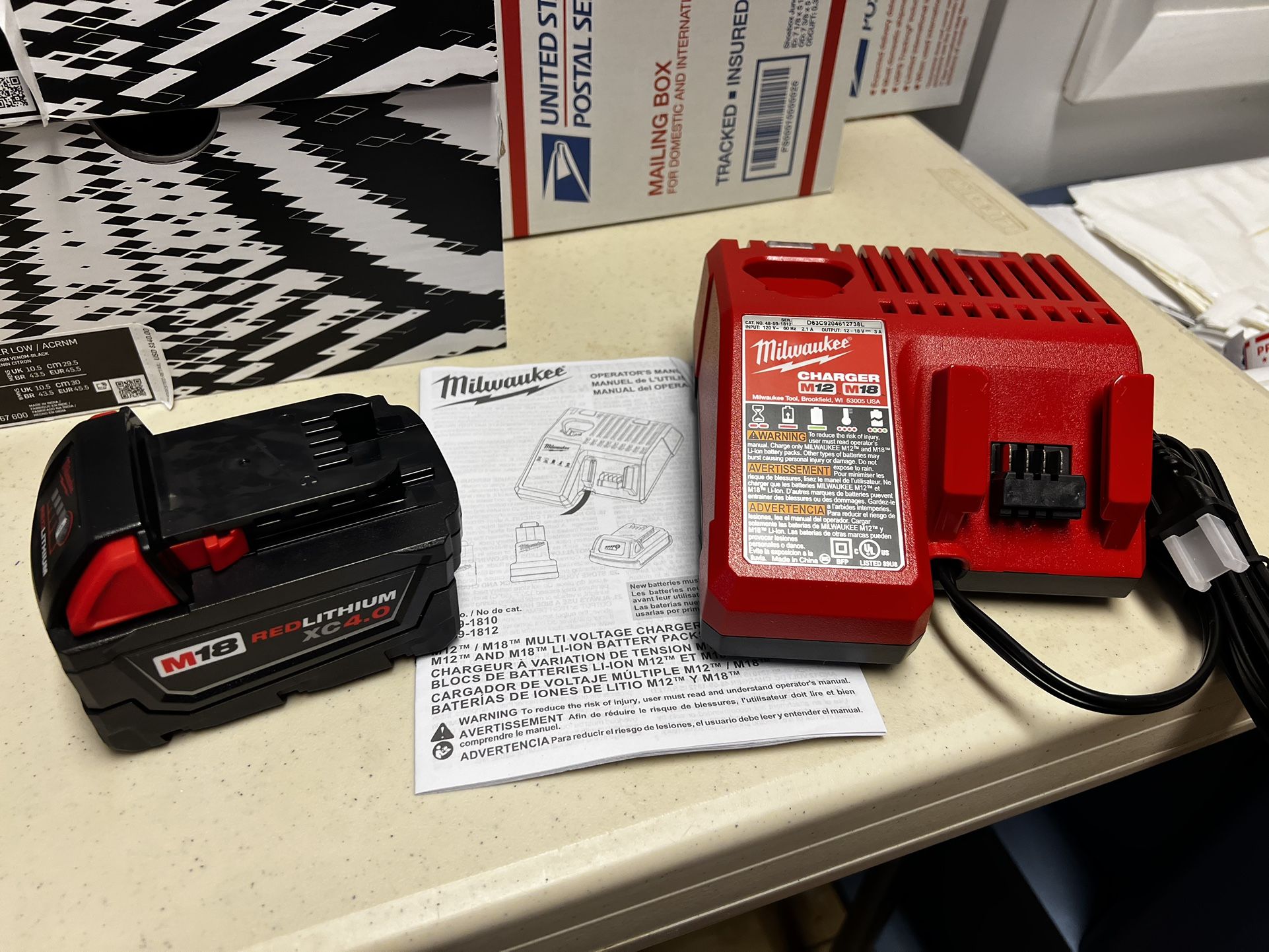 Milwaukee M18 18-Volt 4.0 Ah XC Battery & Charger for M18/M12