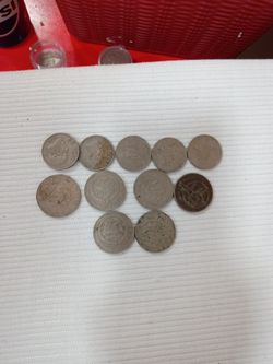 Lot of 11 Mexican Peso Coins