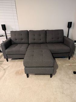 Grey couch reversible sofa & chaise with ottoman