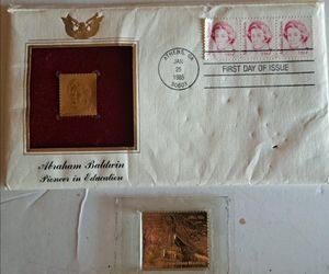 Gold Collectable Stamps - "Benefiting Mankind" & "Abraham Baldwin