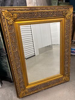 Mirror with gold