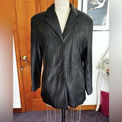 Vintage women’s blac leather blazer- great!