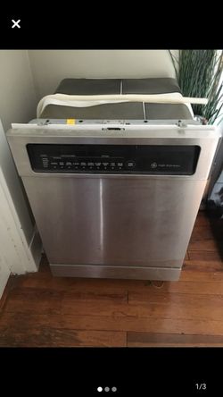 Stainless steel and black General Electric dishwasher