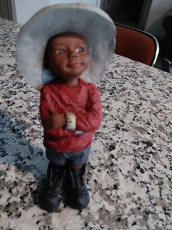 Resin Boy Figurine with Cowboy Hat