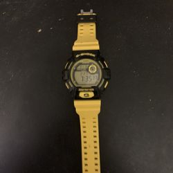 Yellow and black g-shock