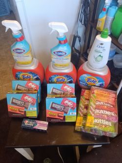 Clorox cleaning sprays,4 variety pack of chocolate candy see pic ,2 Skittles assorted candy packs,3 tide pods,1 toothpaste,1 cucumber DOVE body wash  