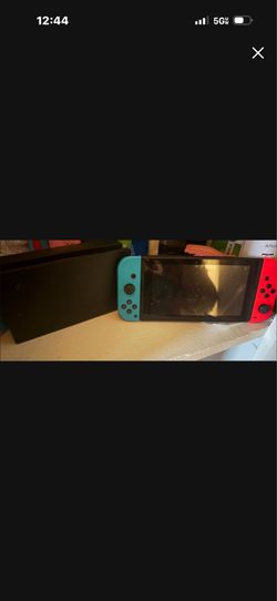 Nintendo Switch with Neon Joy-Cons and Dock