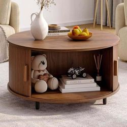 Round Coffee Table with Storage, 31.5" Modern Coffee Table with 360° Curved Sliding Door, Fluted Wood Accent Coffee Table with Adjustable Footpads, Wa