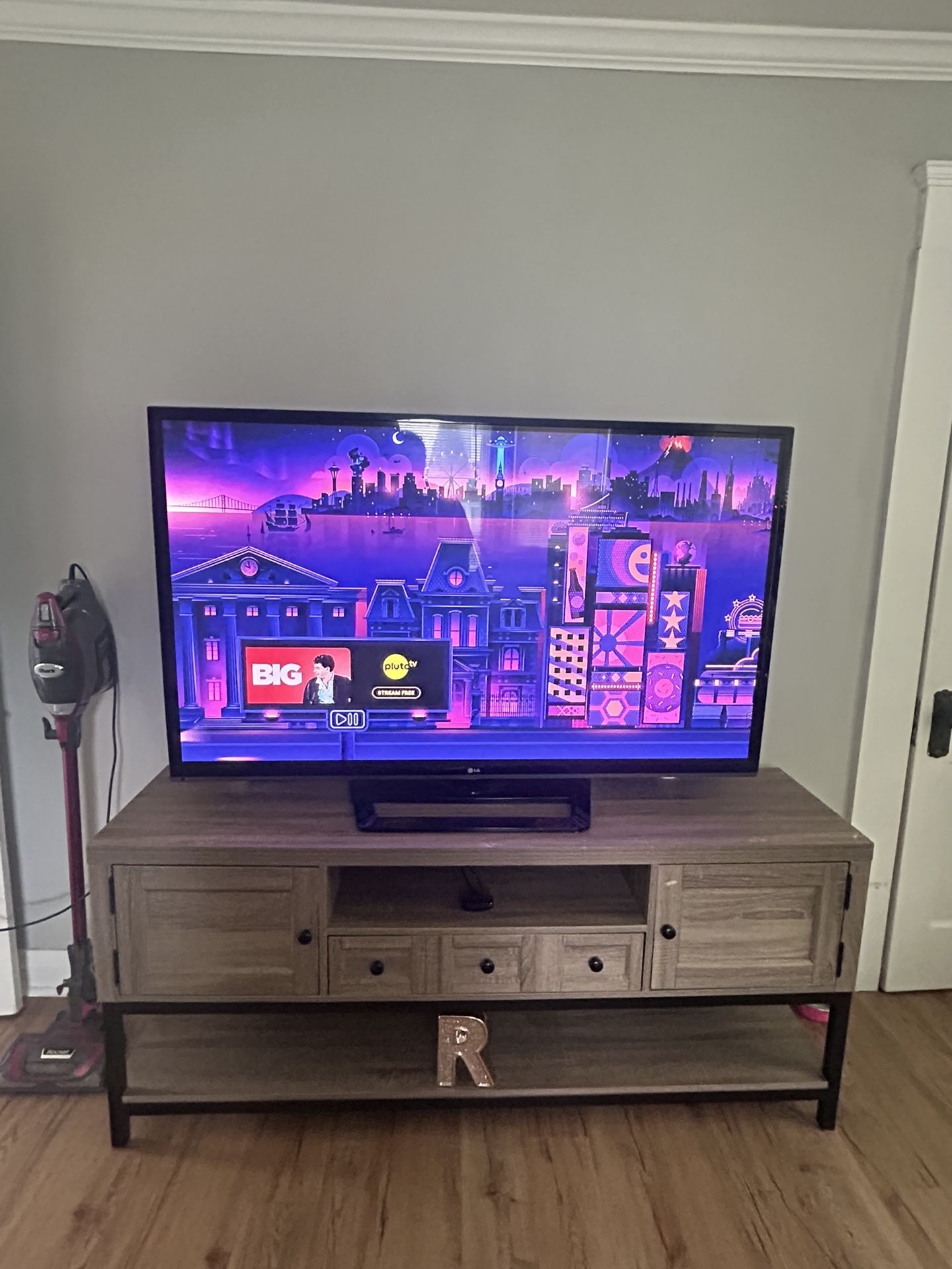 LG 50in TV With Stand And Roku Setup 