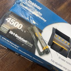 Oscillating sprinkler new In Box