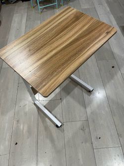 desk table adjustable height with wheel 18$.