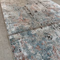 Gently used 6x9 abstract rug