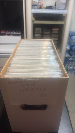 Short box of Superman. Spiderman. 150 comics
