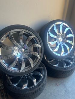 20 inch chrome rims and tires. Universal bolt pattern