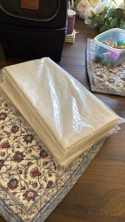 Rowins White Plastic Table Cloth - Disposable