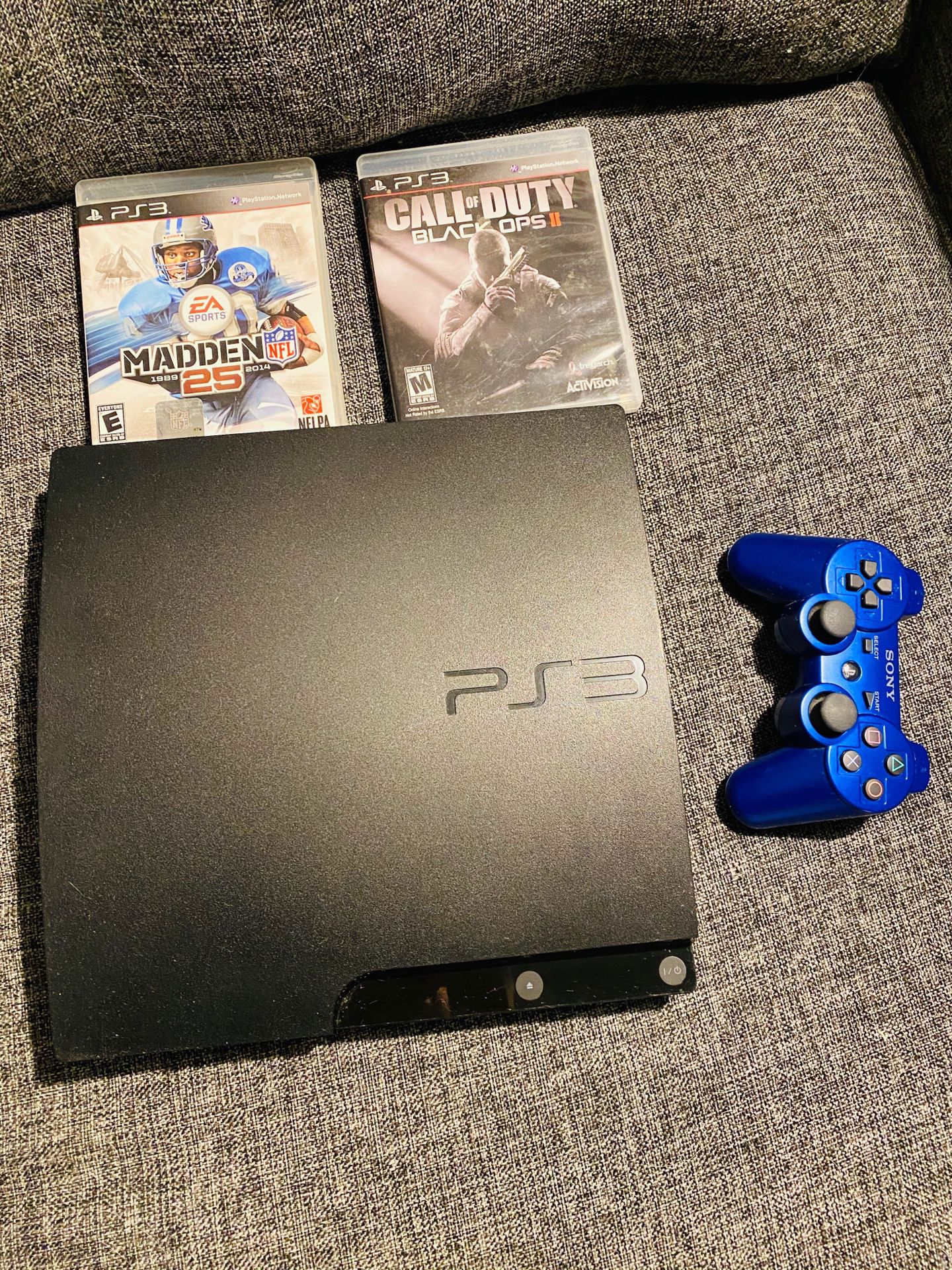 PS3 with games and controller