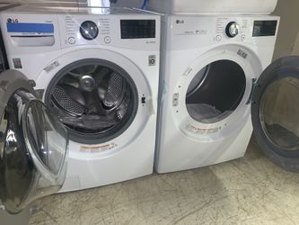 Brand new LG front load washer & electric dryer set