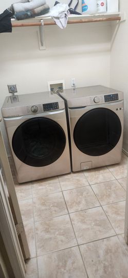 ​Samsung front load washer and matching electric dryer set in a stylish Champagne/Platinum finish. Purchased new less than 3 years ago and maintained 