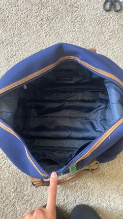 Used travel bag with wheels