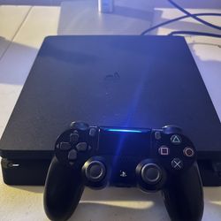 PlayStation 4 System W/ Controller & Game