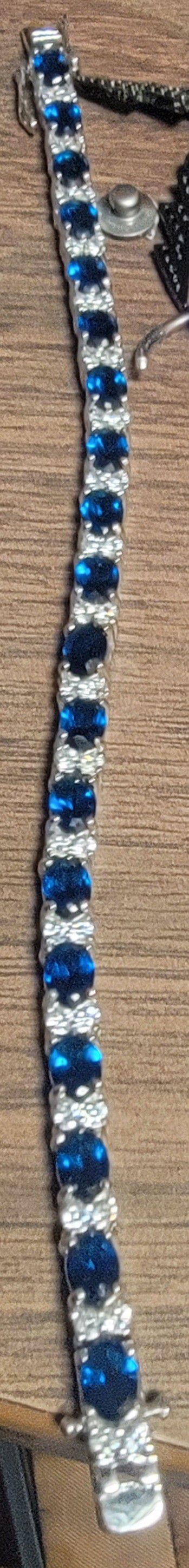 14 1/4 CT TGW Created Blue & White Sapphire Bracelet in Sterling Silver

$130