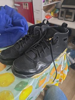 Black and gold jordans