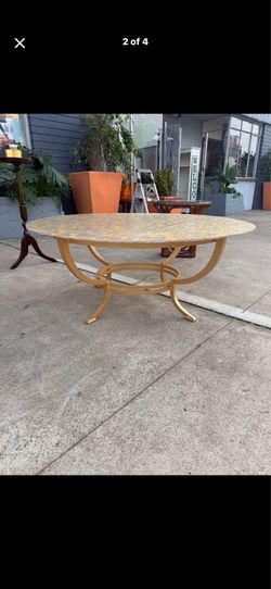 Mid Century, solid metal base coffee table 48 diameter 19 tall