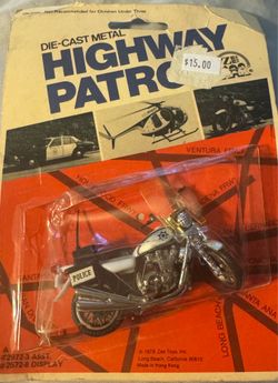Die cast metal highway patrol cycle