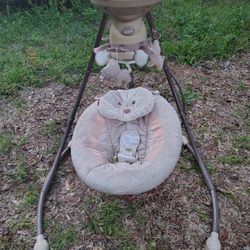 Baby Swing with all the bells & whistles 