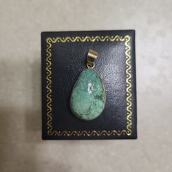 14 k gold pendant.  The total weight is 6.3 grams