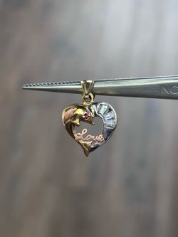 10kt gold heart charm with CZ