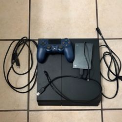 PS4 with Control, Charger, 2TB Hard Drive Extension, HDMI Cable And Games Included. 