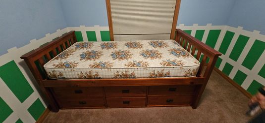 Captains bed frame with twin sized mattress