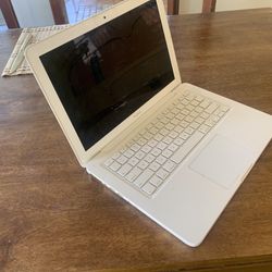 Older Apple MacBook With Charger. Working (