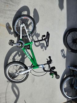 Woom 2 Green pedal kids bike