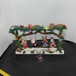 VNTG Swinging Christmas Figures