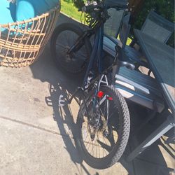 Schwinn Sidewinder mountain bike, 24-inch wheels- 21 speeds - black / teal

