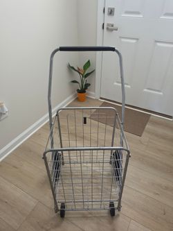 Folding metal shopping cart with stairs climbing wheels
