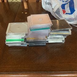 MAKE AN OFFER: Assorted CD/DVD Cases, Please See Photos For Details.