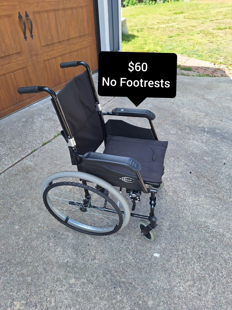 Wheelchair Foldable No Footrests $40