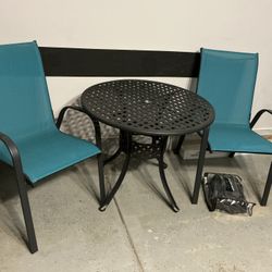 Table and Two Turquoise Blue Chairs Patio Set With Table Cover
