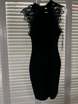 Dress with detailed around sleeves