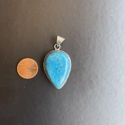 Turquoise And Silver Pendant