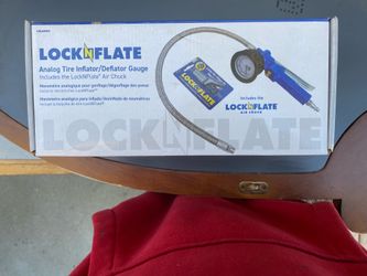 LockNFlate analog tire inflator/deflator gauge includes the lock and inflate air chunk