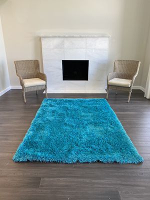 Photo Ultra soft and nice quality viscose shaggy area rug in turquoise blue with a hint of green. Approx 5 x 7. Shimmery. Pile height is 2” so super high p
